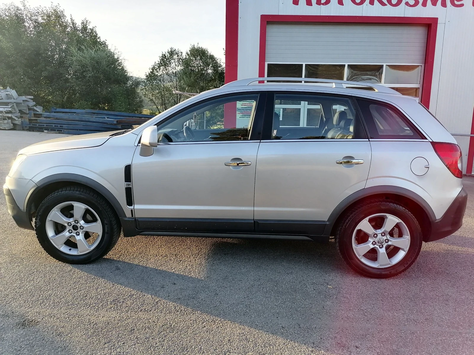 Opel Antara 4x4/Кожа/Автомат/Ксенон, снимка 8 - Автомобили и джипове - 56330428