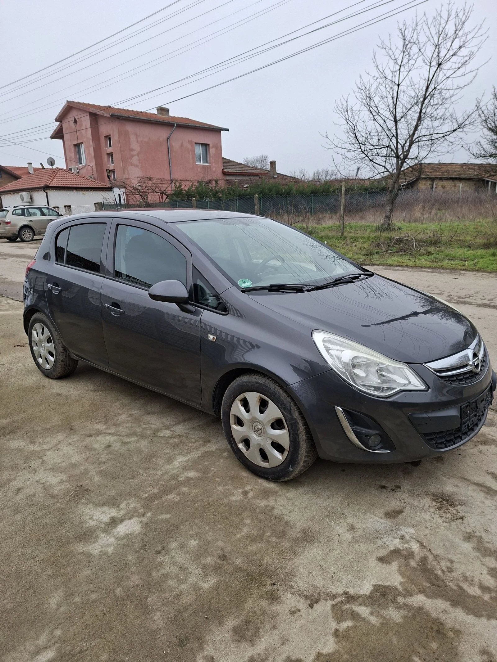 Opel Corsa 1.3 75 к.с. - изображение 8