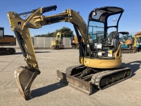 Багер Cat 030ESR
