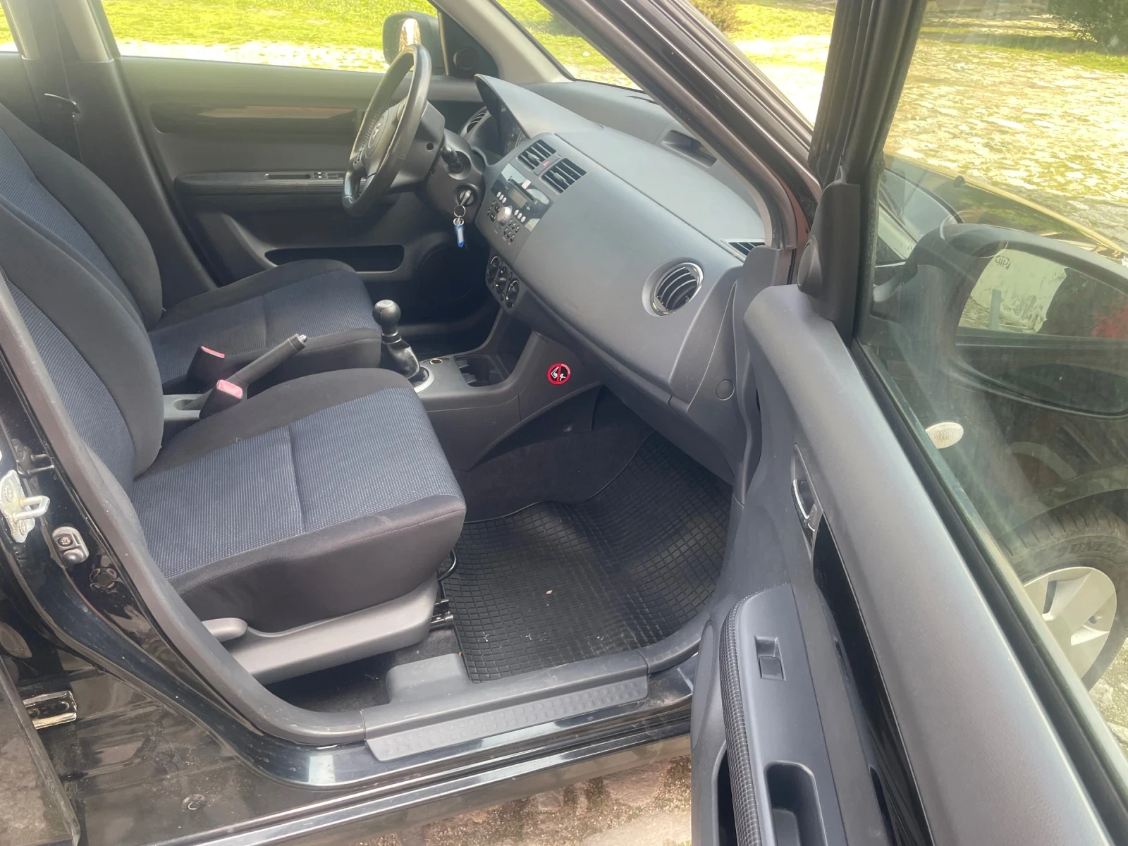 Suzuki Swift 1.3i 4X4 92ks KLIMATIK, снимка 11 - Автомобили и джипове - 53707812