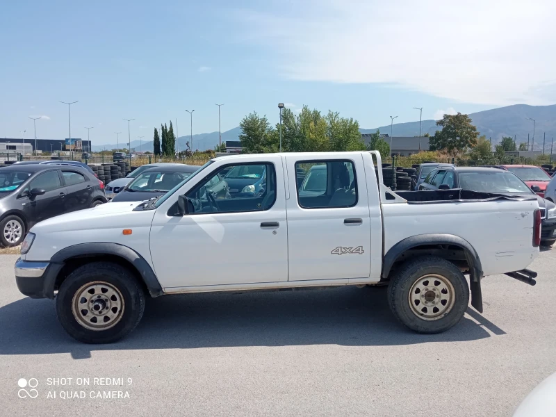 Nissan Navara 2.5 дизел, снимка 9 - Автомобили и джипове - 46857673