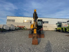      JCB JS 145 W 4-  