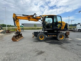      JCB JS 145 W 4-  