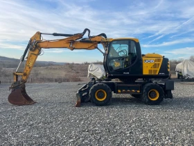      JCB JS 145 W 4-  