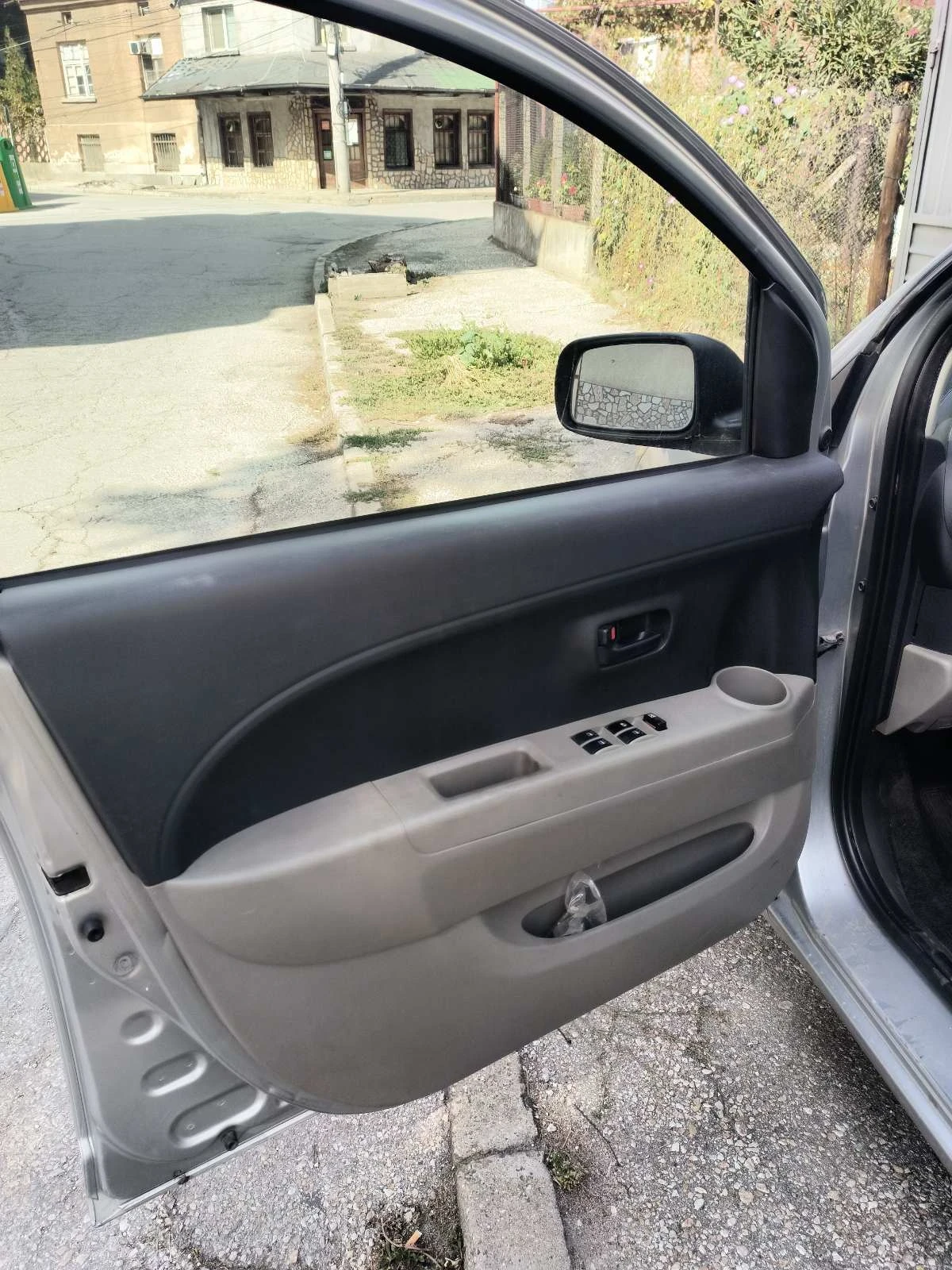 Daihatsu Sirion, снимка 10 - Автомобили и джипове - 56561241