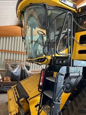      New Holland CR 9.90 + 12   
