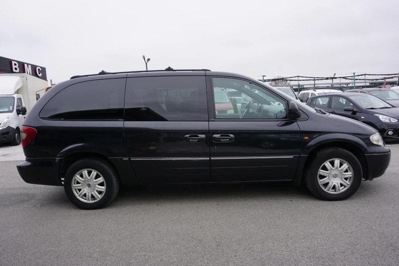 Chrysler Voyager 2.8 CRD/7места/автомат/кожен салоник, снимка 8 - Автомобили и джипове - 47987964