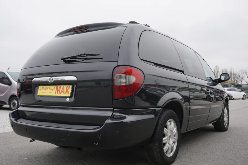 Chrysler Voyager 2.8 CRD/7места/автомат/кожен салоник, снимка 7 - Автомобили и джипове - 47987964