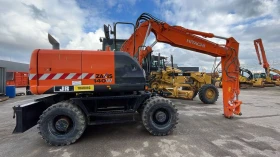 Багер Hitachi ZX 140 W-5B, снимка 1