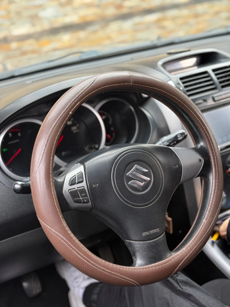 Suzuki Grand vitara 1.9 DDiS 4x4/NAVI/MULTI, снимка 7 - Автомобили и джипове - 52657168
