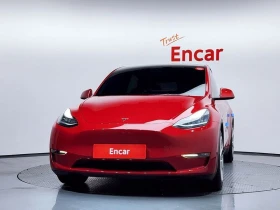 Tesla Model Y Dual Motor Long Range AWD - 26150 € / 51144.95 лв. - 52632072 3