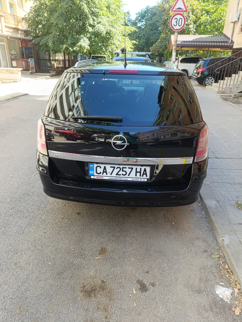 Opel Astra, снимка 12 - Автомобили и джипове - 52213095