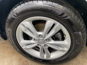 Hyundai Tucson 2.0crdi 136кс Кожа, снимка 15