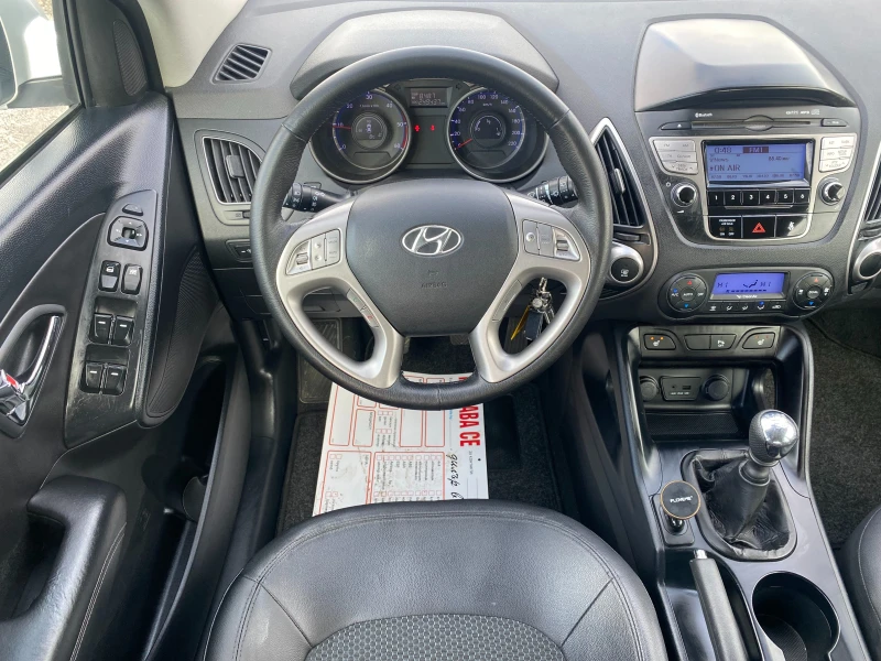 Hyundai Tucson 2.0crdi 136кс Кожа, снимка 7 - Автомобили и джипове - 52215152