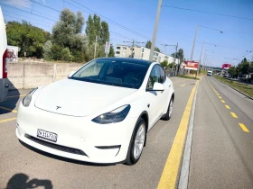 ������ Tesla Model Y