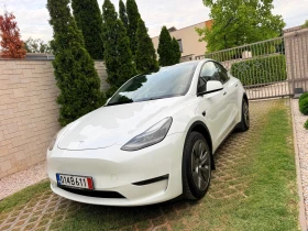������ Tesla Model Y
