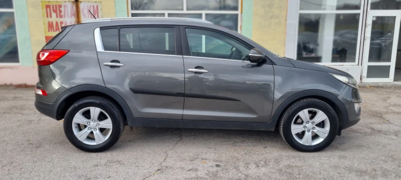 Kia Sportage 2.0 CRDI FULL, снимка 8 - Автомобили и джипове - 48043776