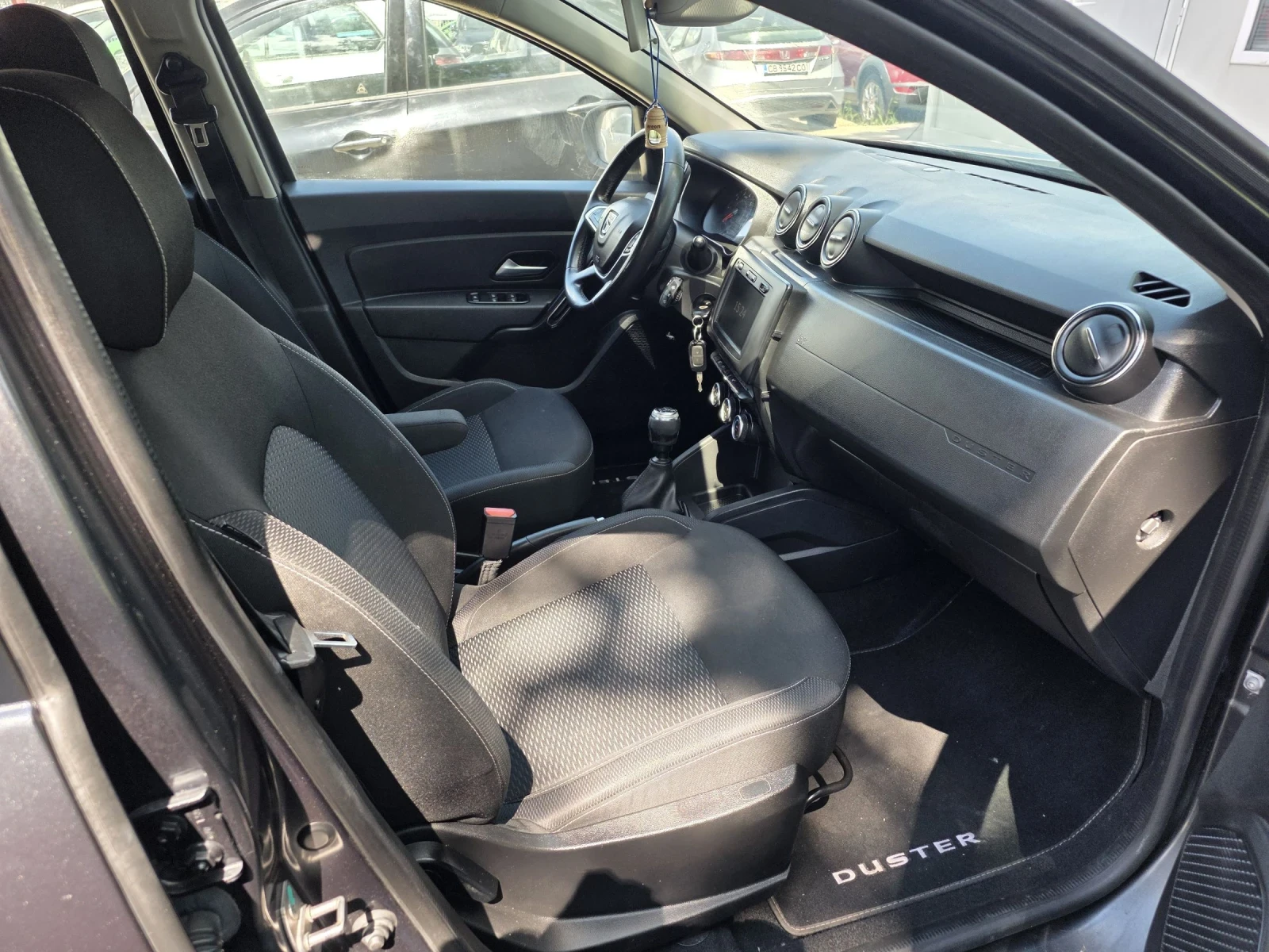 Dacia Duster 1.5DCI/110HP/NAVI/CAMERA, снимка 11 - Автомобили и джипове - 54693124