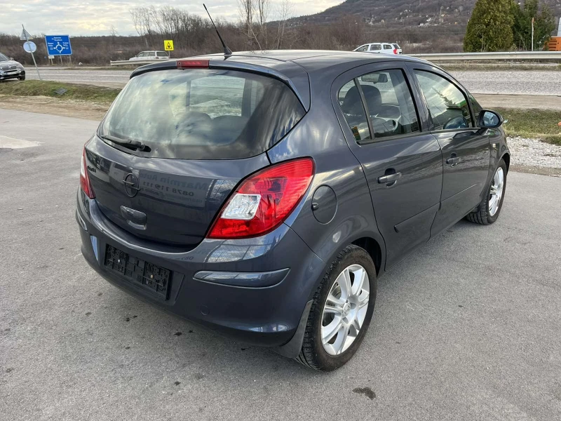 Opel Corsa 1.0I 60кс EURO 4 КЛИМАТИК , снимка 4 - Автомобили и джипове - 53078959