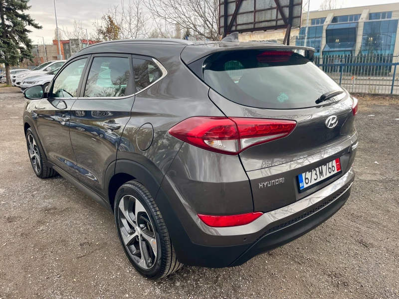 Hyundai Tucson 1.7CRDI, NAVI, AUTOMATIC, кожен салон, снимка 4 - Автомобили и джипове - 48067321