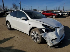 Tesla Model Y DUAL MOTOR LONG RANGE AWD ТЕРМОПОМПА* АВТОПИЛОТ*  - 18500 € / 36182.85 лв. - 88961708 4