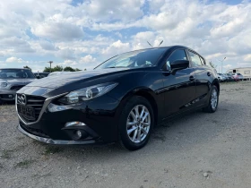 ������ Mazda 3