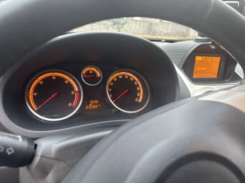 Opel Corsa 1.3, снимка 11 - Автомобили и джипове - 48825622