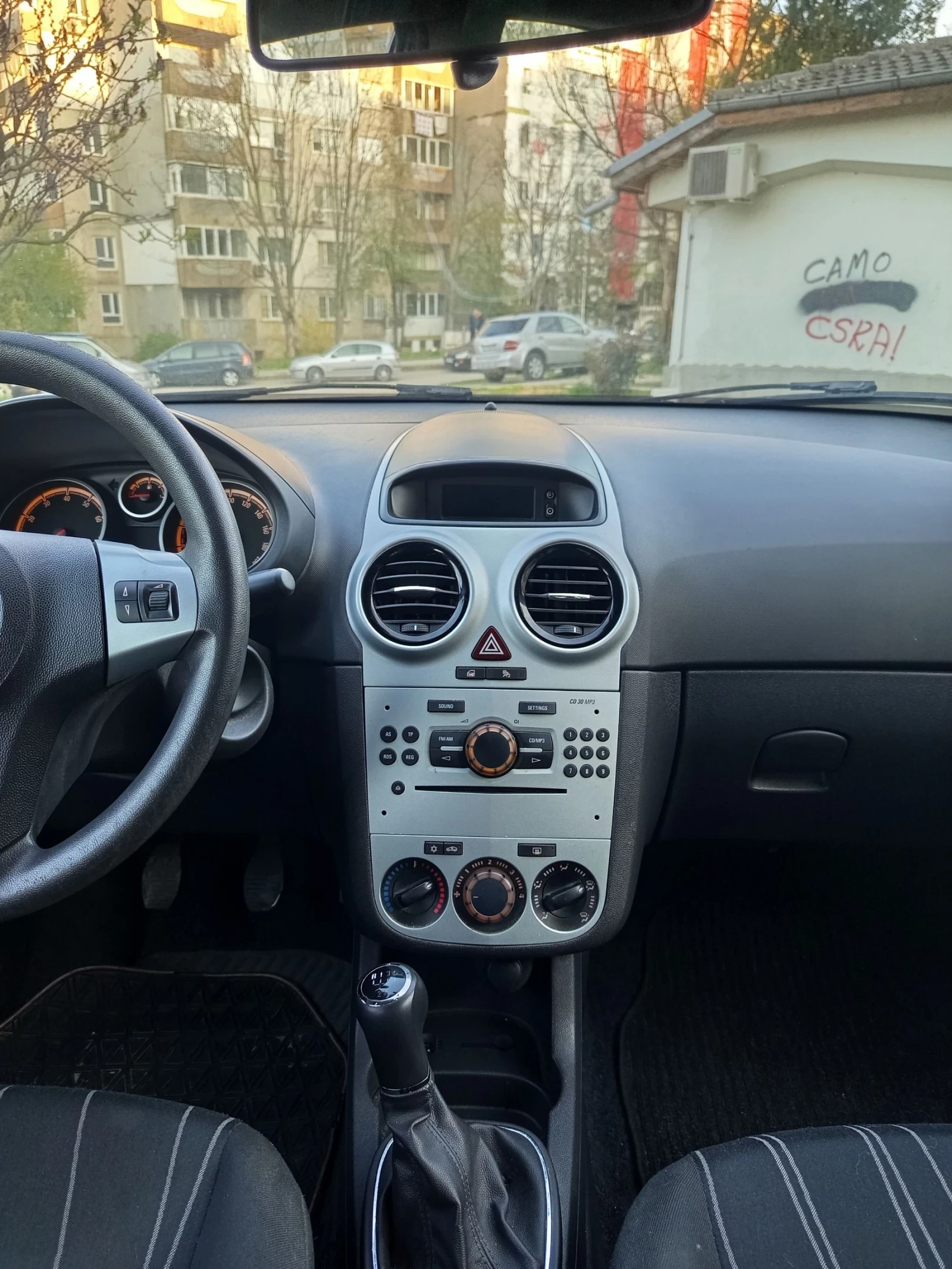 Opel Corsa 1.2i, снимка 12 - Автомобили и джипове - 54230196