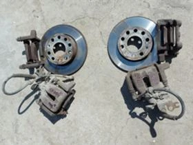 предни и задни спирачни апарати и дискове за VW Caddy 08г., снимка 5