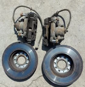 предни и задни спирачни апарати и дискове за VW Caddy 08г., снимка 2