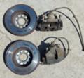 предни и задни спирачни апарати и дискове за VW Caddy 08г., снимка 1 - Части - 32755318