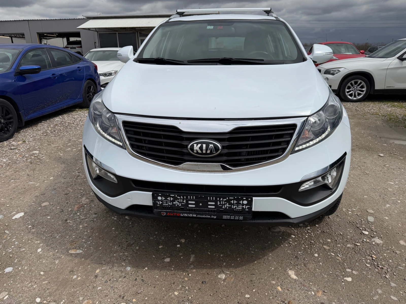 Kia Sportage 2.0 CRDI 4X4(КАТО НОВ), снимка 2 - Автомобили и джипове - 54037554