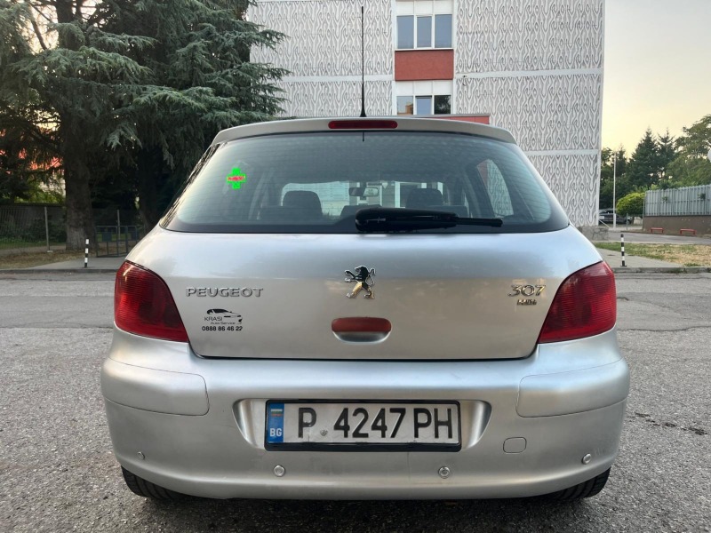 Peugeot 307  ОБСЛУЖЕНА + 4 ЗИМНИ ГУМИ / ВСИЧКО ПЛАТЕНО !, снимка 6 - Автомобили и джипове - 46434250