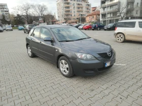 ������ Mazda 3