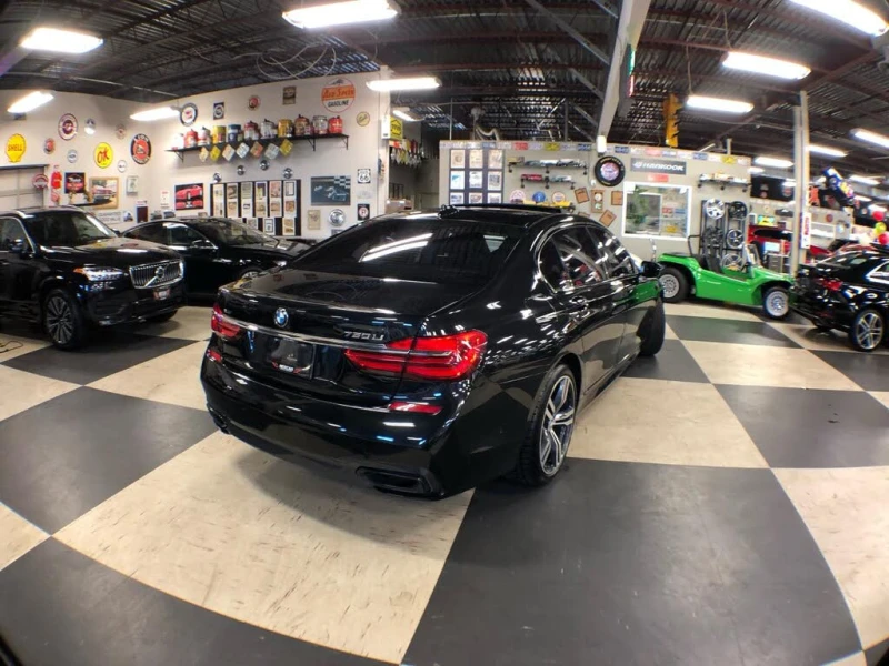 BMW 750 ОБДУХВАНЕ* ДИСТРОНИК* 360* СЛЕДЕНЕ НА ЛЕНТИ* ПАНО, снимка 6 - Автомобили и джипове - 52724296