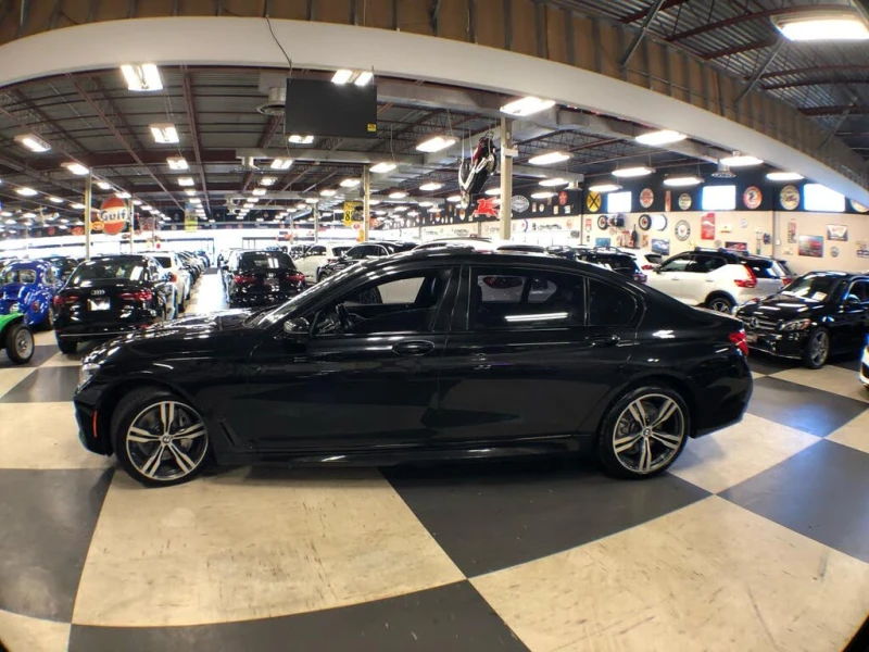 BMW 750 ОБДУХВАНЕ* ДИСТРОНИК* 360* СЛЕДЕНЕ НА ЛЕНТИ* ПАНО, снимка 7 - Автомобили и джипове - 52724296