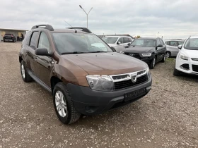 Dacia Duster 1.6i 4x4 CH 6sk, снимка 3