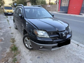 ������ Mitsubishi Outlander