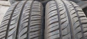 Гуми Летни 205/70R14, снимка 1