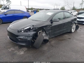 Tesla Model 3 U  U UX All Wheel Drive, снимка 2