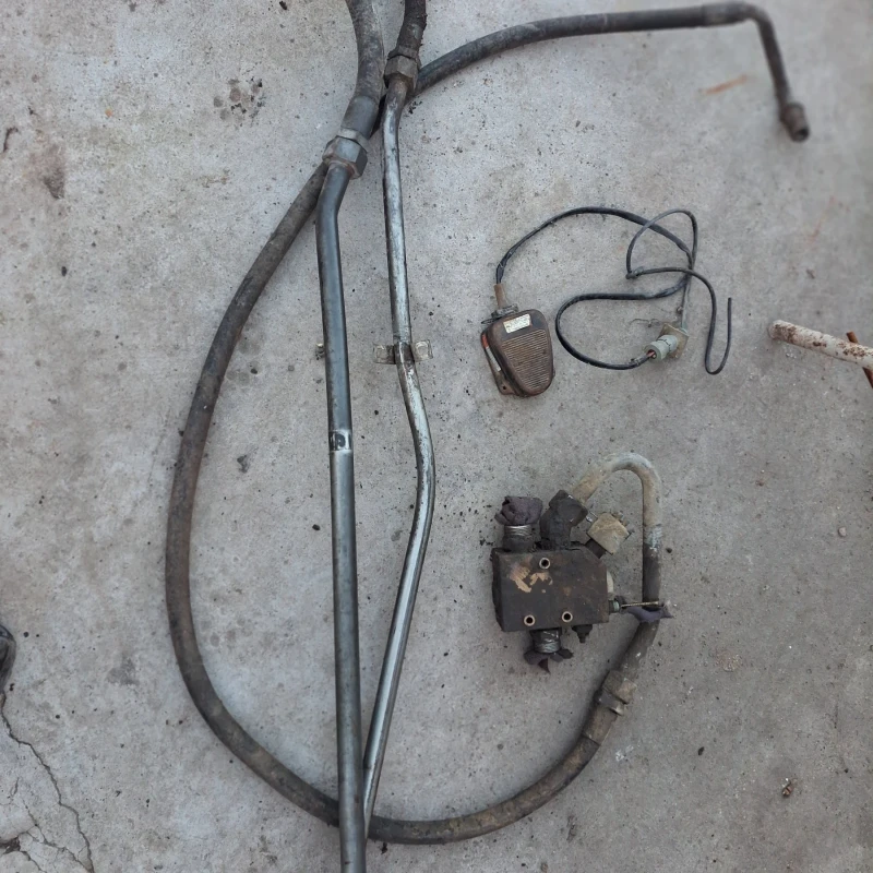 Багер Komatsu Case, New Holland