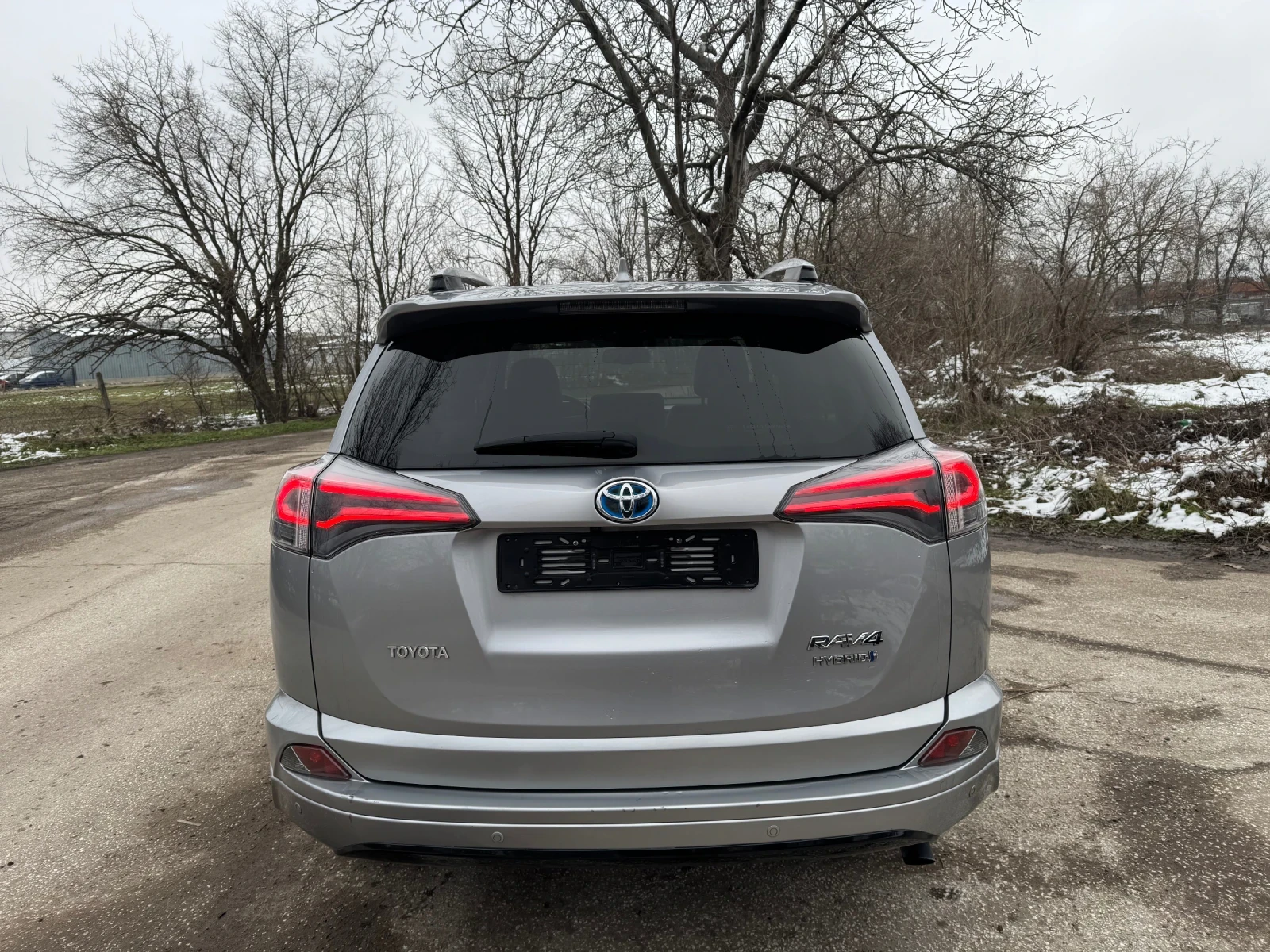 Toyota Rav4 2.5HYBRID EXECUTIVE.АВТО.КОЖА.КЕЙЛЕС.НАВИ. - изображение 4