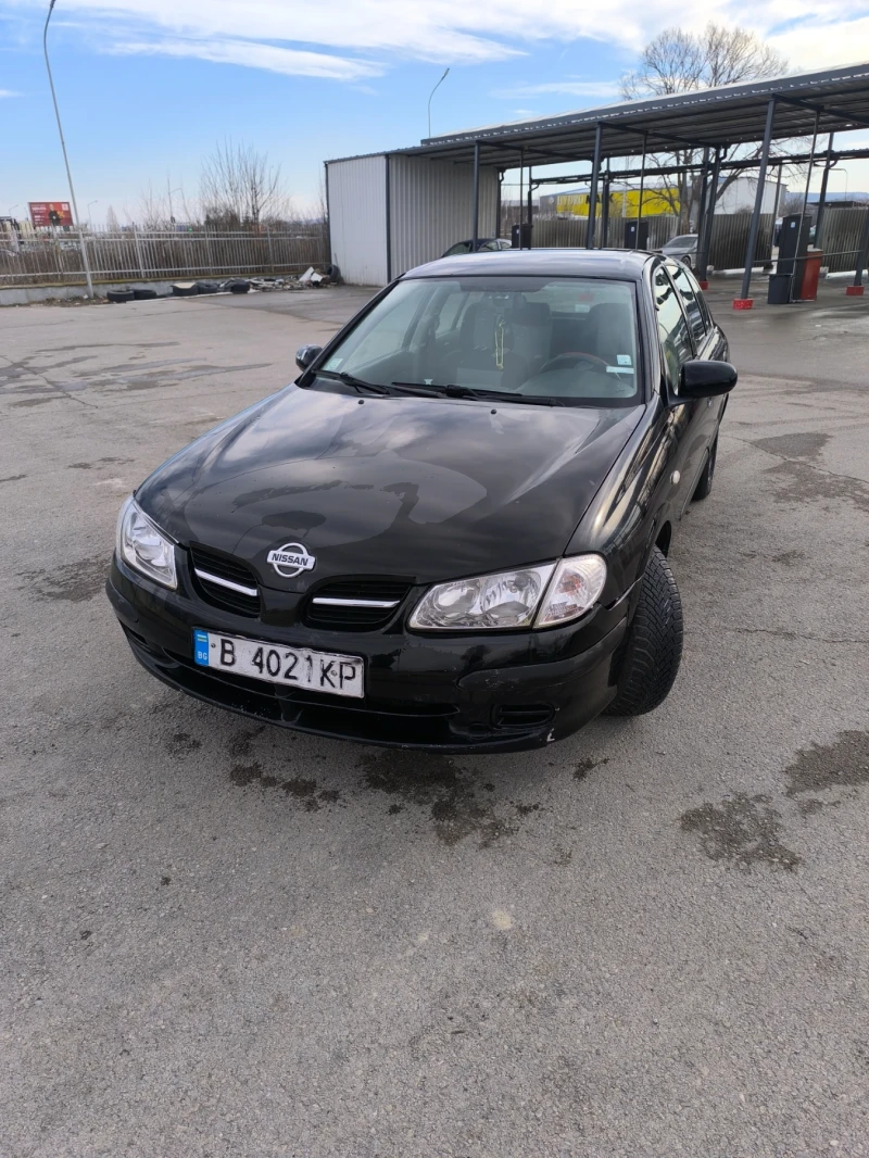 Nissan Almera, снимка 9 - Автомобили и джипове - 48629745