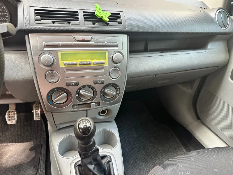 Mazda 2, снимка 9 - Автомобили и джипове - 53098400