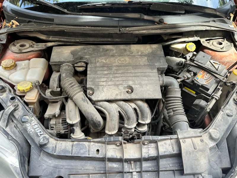 Mazda 2, снимка 10 - Автомобили и джипове - 53098400