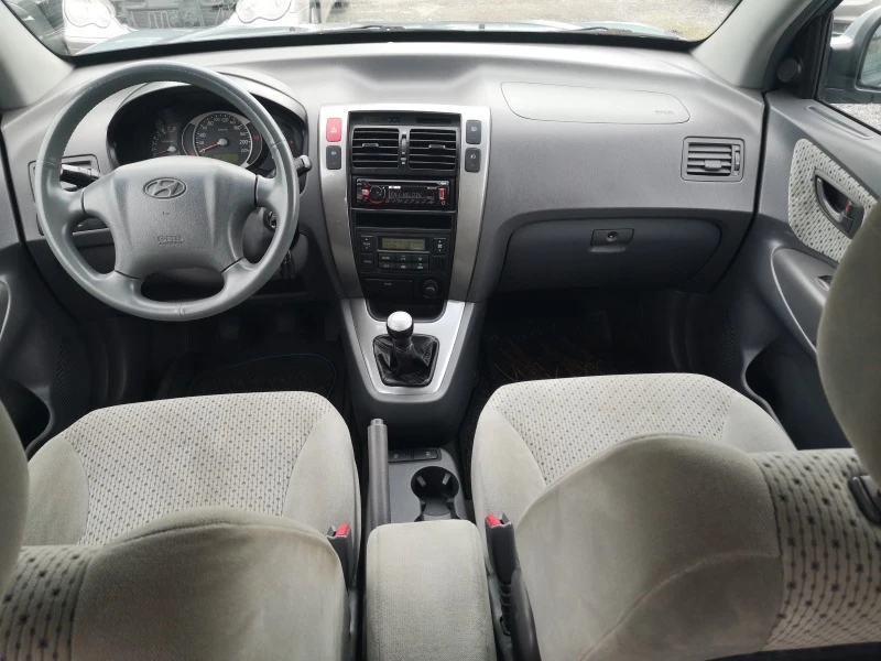 Hyundai Tucson 2.0i/4x4, снимка 10 - Автомобили и джипове - 45778818