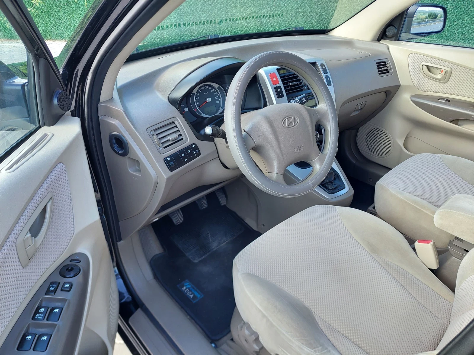 Hyundai Tucson 2.0crdi, снимка 7 - Автомобили и джипове - 54742125