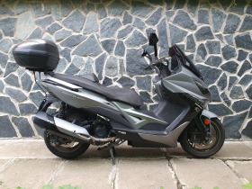     Kymco Xciting 400i ABS ~5 150 .