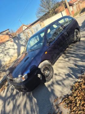 Nissan Almera 1.4 бензин, снимка 7