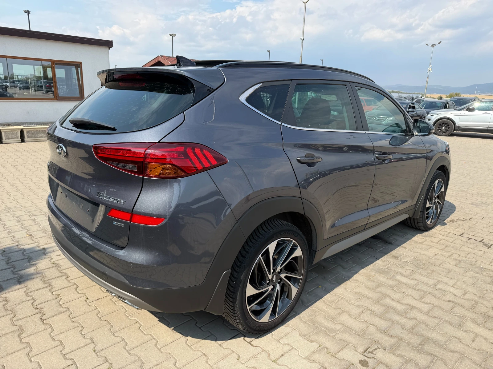 Hyundai Tucson 1.6CRDI 4WD AVTOMAT/NAVI/KOJA/KAMERA EURO 6, снимка 6 - Автомобили и джипове - 56166255